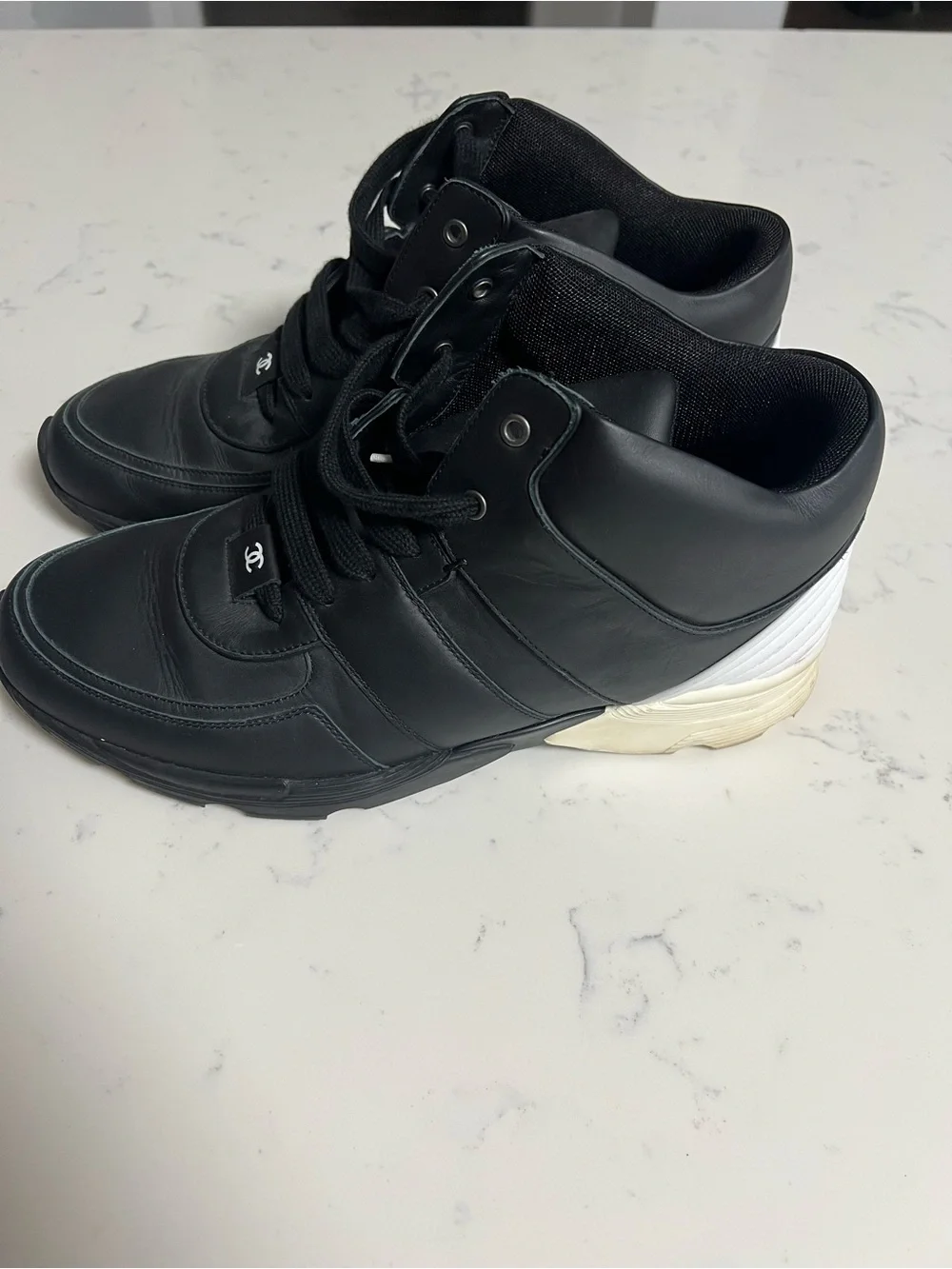 CHANEL Black Men's High-Top Leather Sneakers with Logo Tab